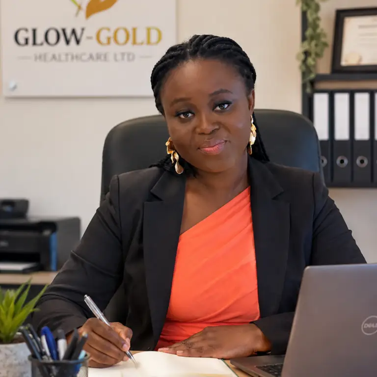 Christiana Gyamfi, Registered Manager, at her desk